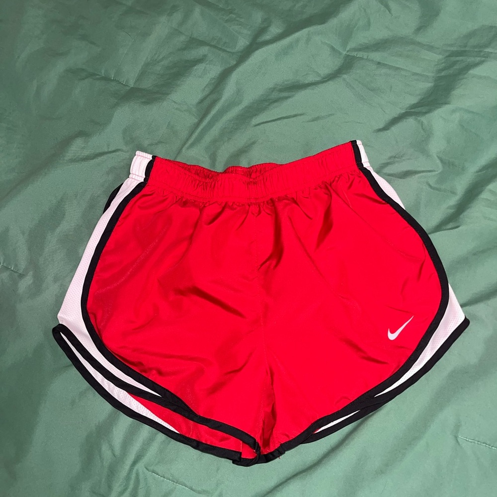Red Nike shorts